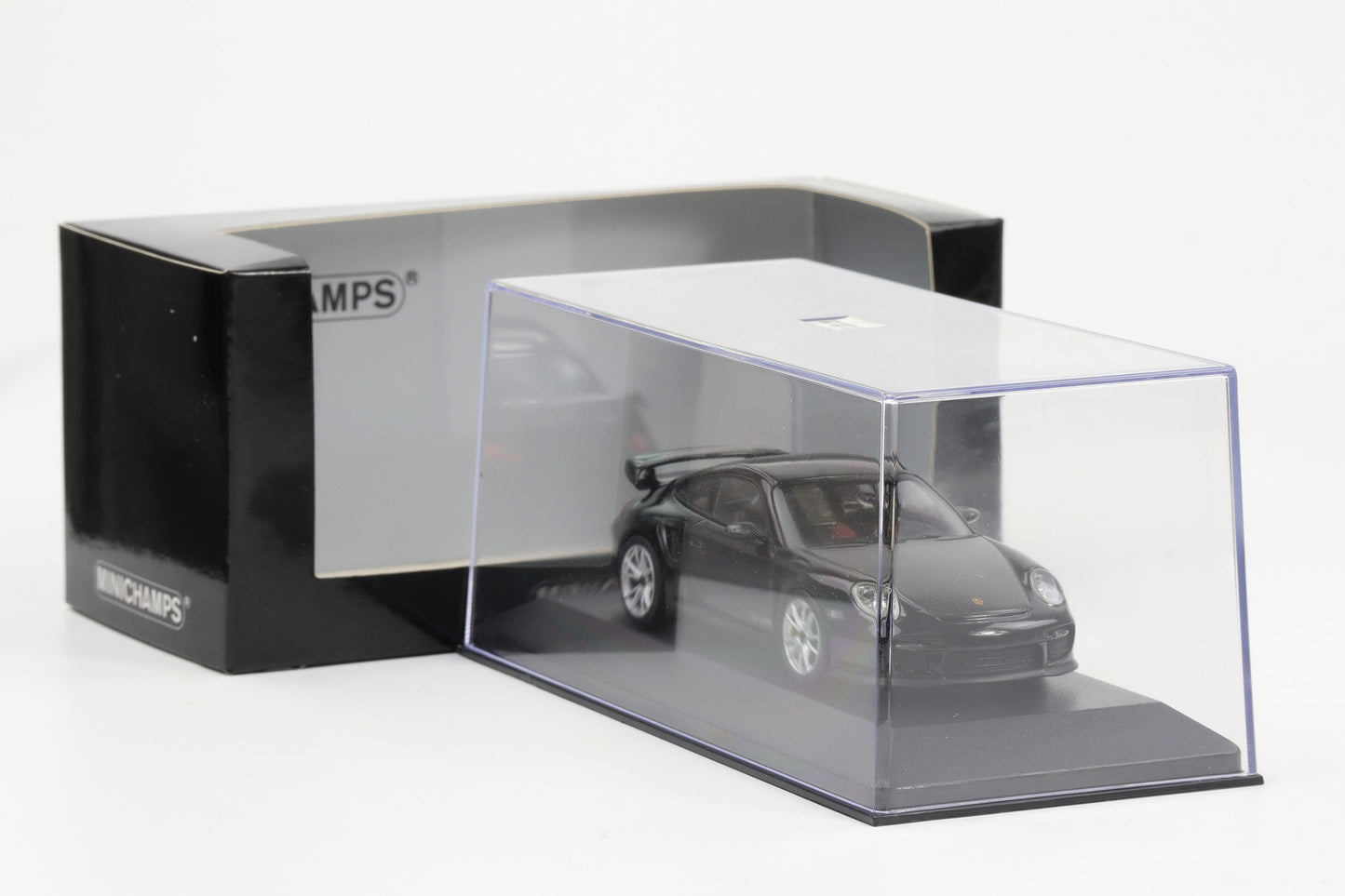 1:43 Minichamps Porsche 911 997 II GT2 RS 2010 schwarz carbon / silberne Felgen