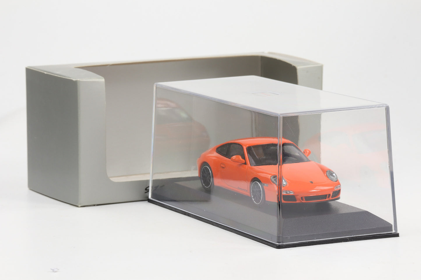 1:43 Minichamps Porsche 911 997.2 Carrera 4 GTS orange Dealer WAP 020 114 0C