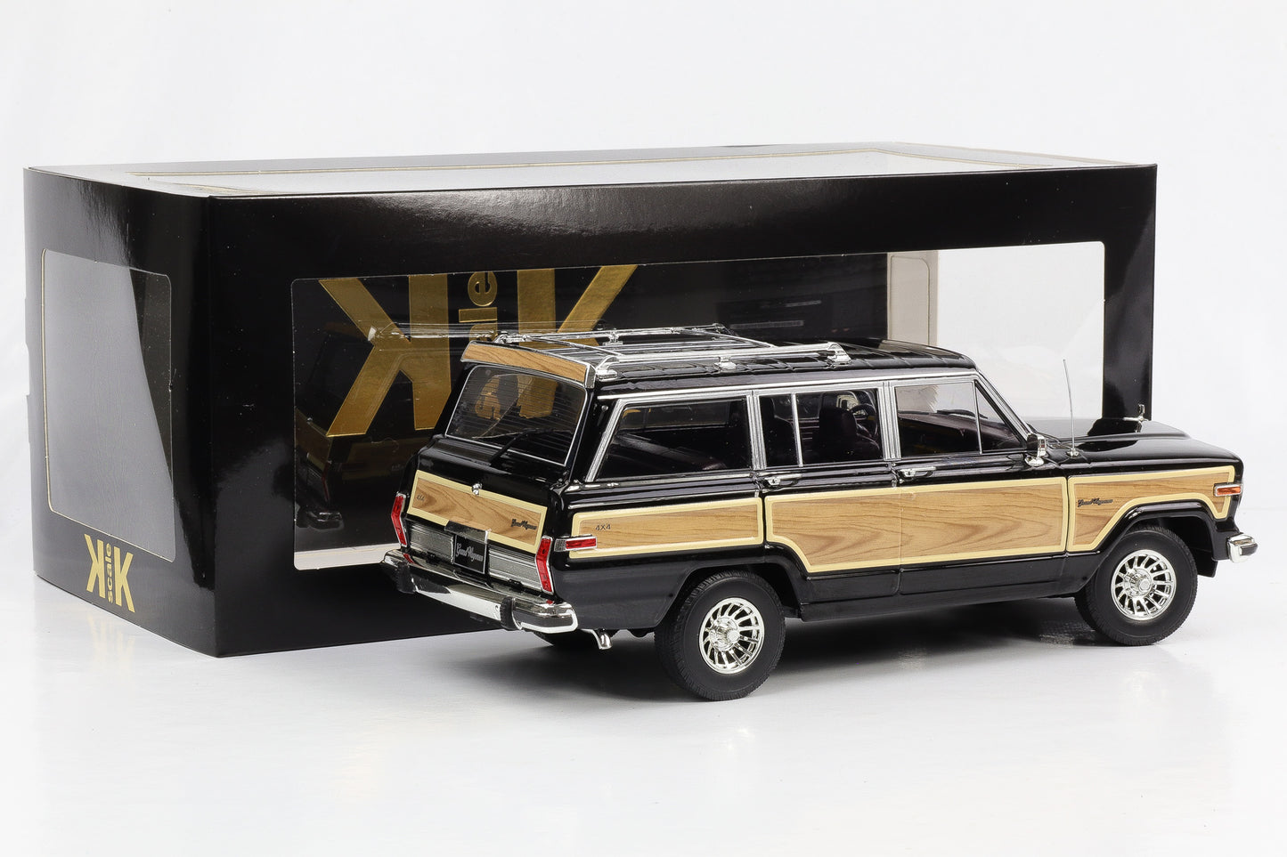1:18 Jeep Grand Wagoneer Baujahr 1989 schwarz Holzoptik KK Scale diecast
