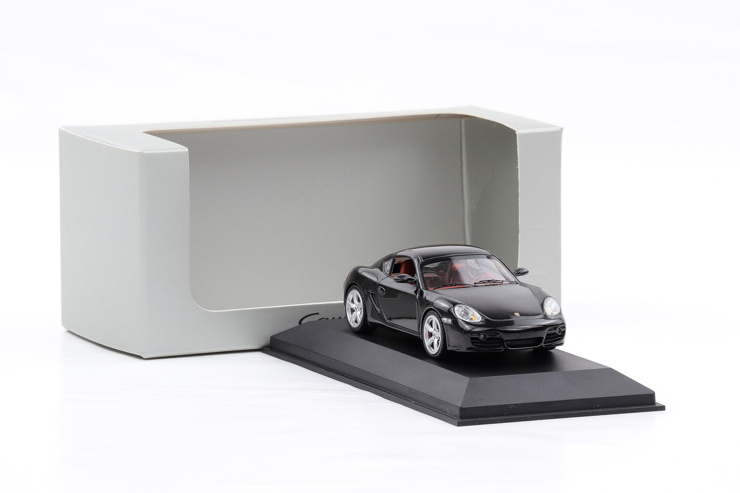 1:43 Schuco Porsche Cayman S 987 2009 schwarz WAP Delaer