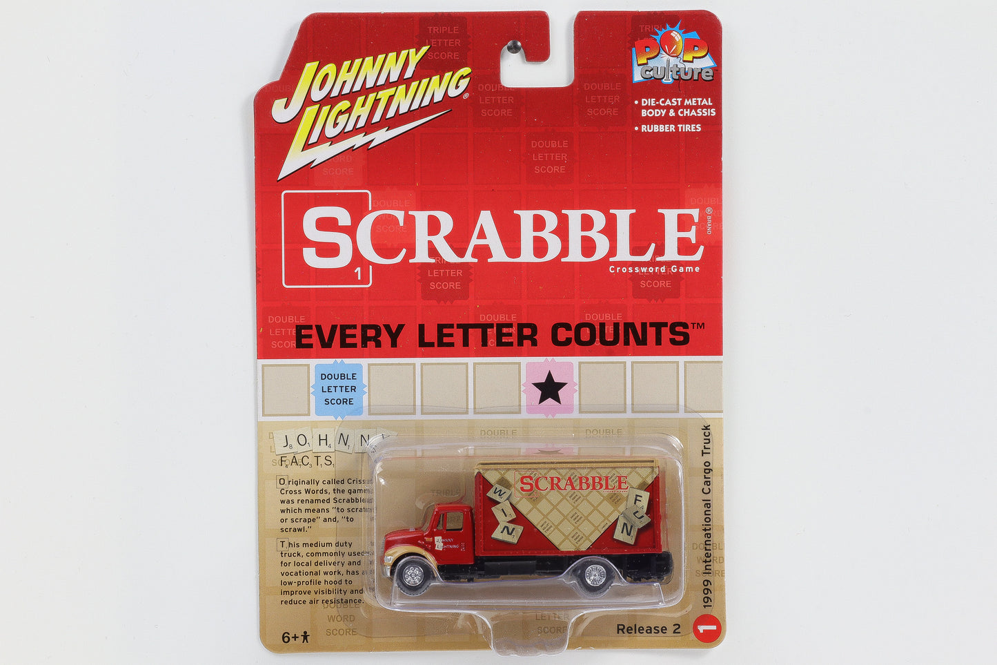 1:64 1999 International Cargo Truck Scrabble Johnny Lightning Pop Culture