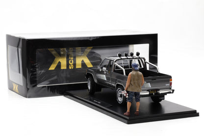 1:18 Toyota Hilux SR5 Truck Xtra Cab 4x4 1985 graumetallic + Figur KK Skale