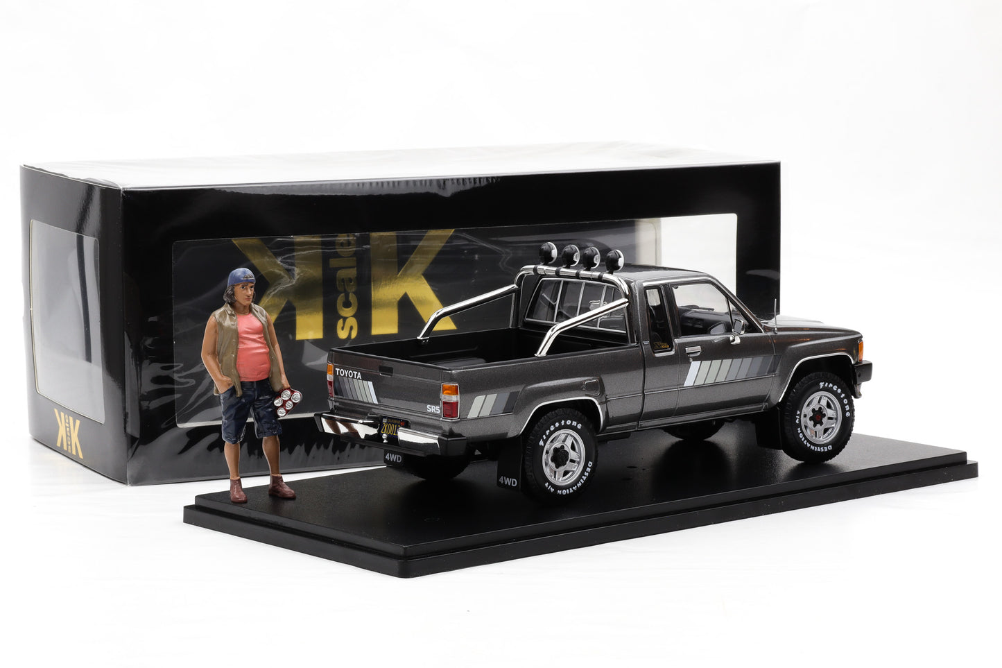 1:18 Toyota Hilux SR5 Truck Xtra Cab 4x4 1985 graumetallic + Figur KK Skale