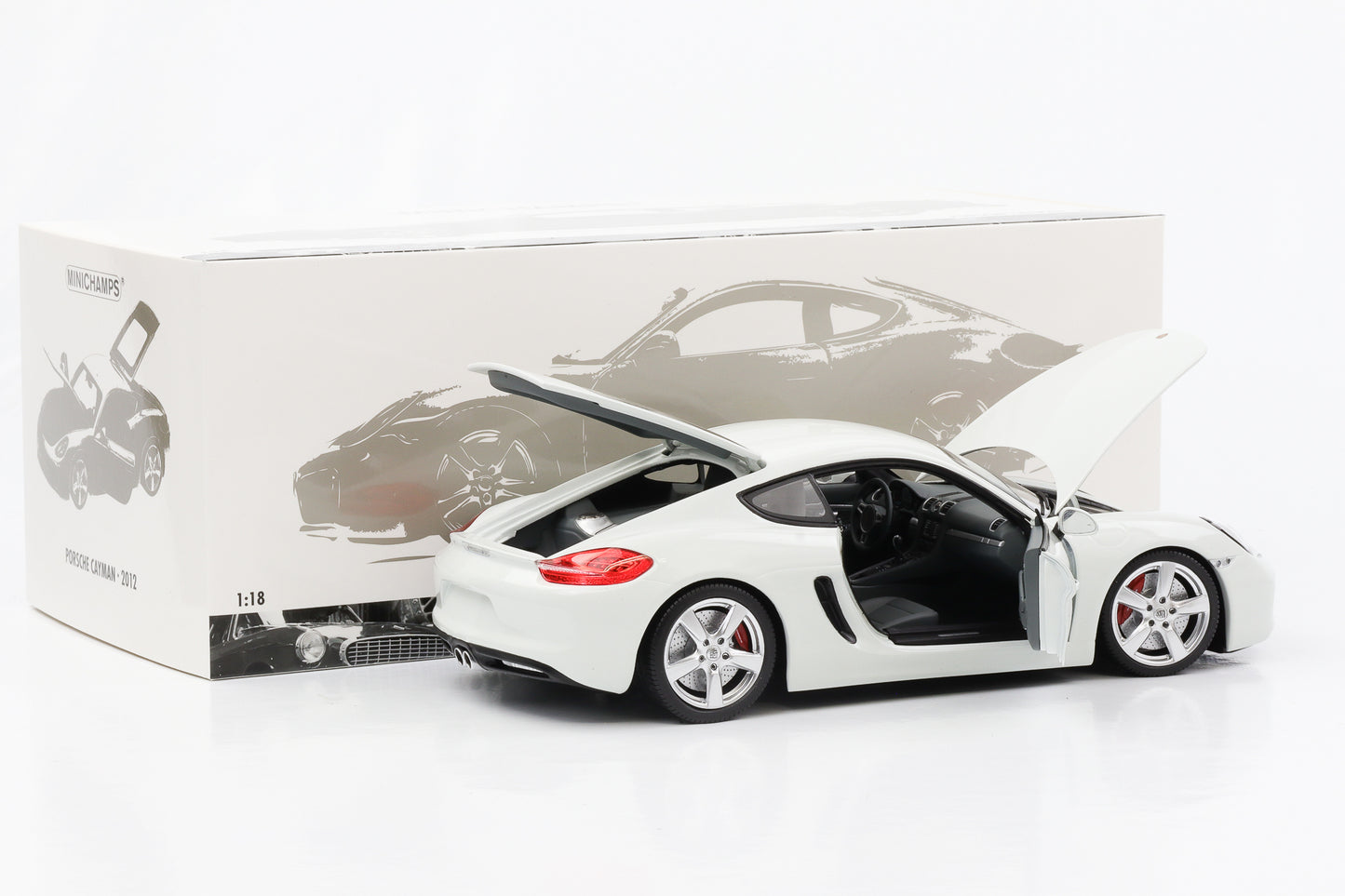 Apertura pressofusa della Porsche Cayman S 2012 Minichamps bianca in scala 1:18