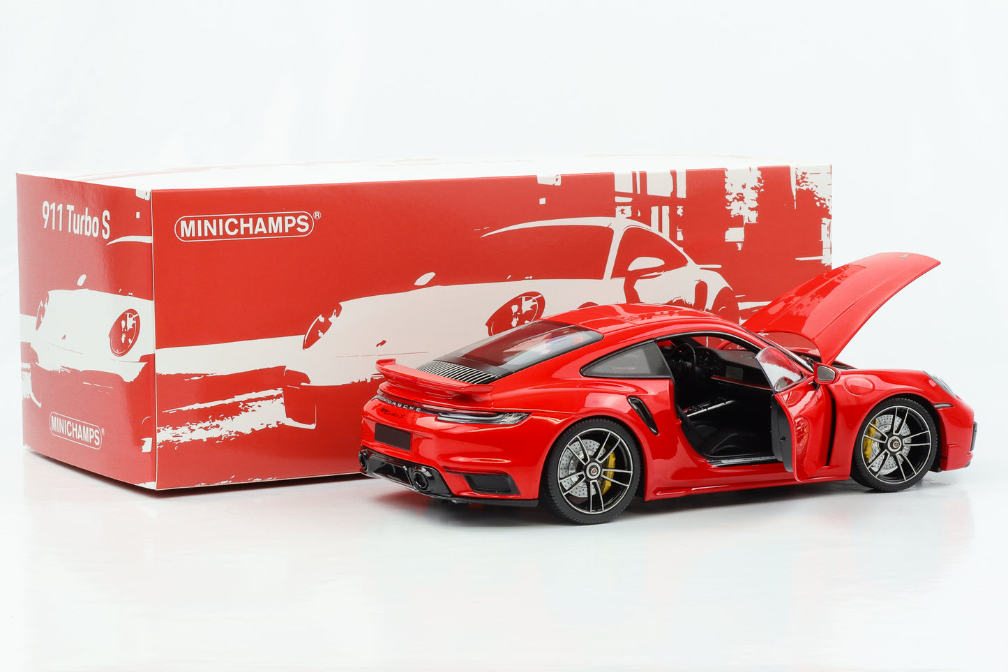 1:18 Porsche 911 992 Turbo S Coupé Sport Design 2021 rouge indien Minichamps