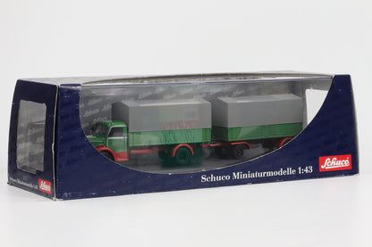 1:43 Schuco Krupp Titan Planen LKW mit Anhänger grün OVP