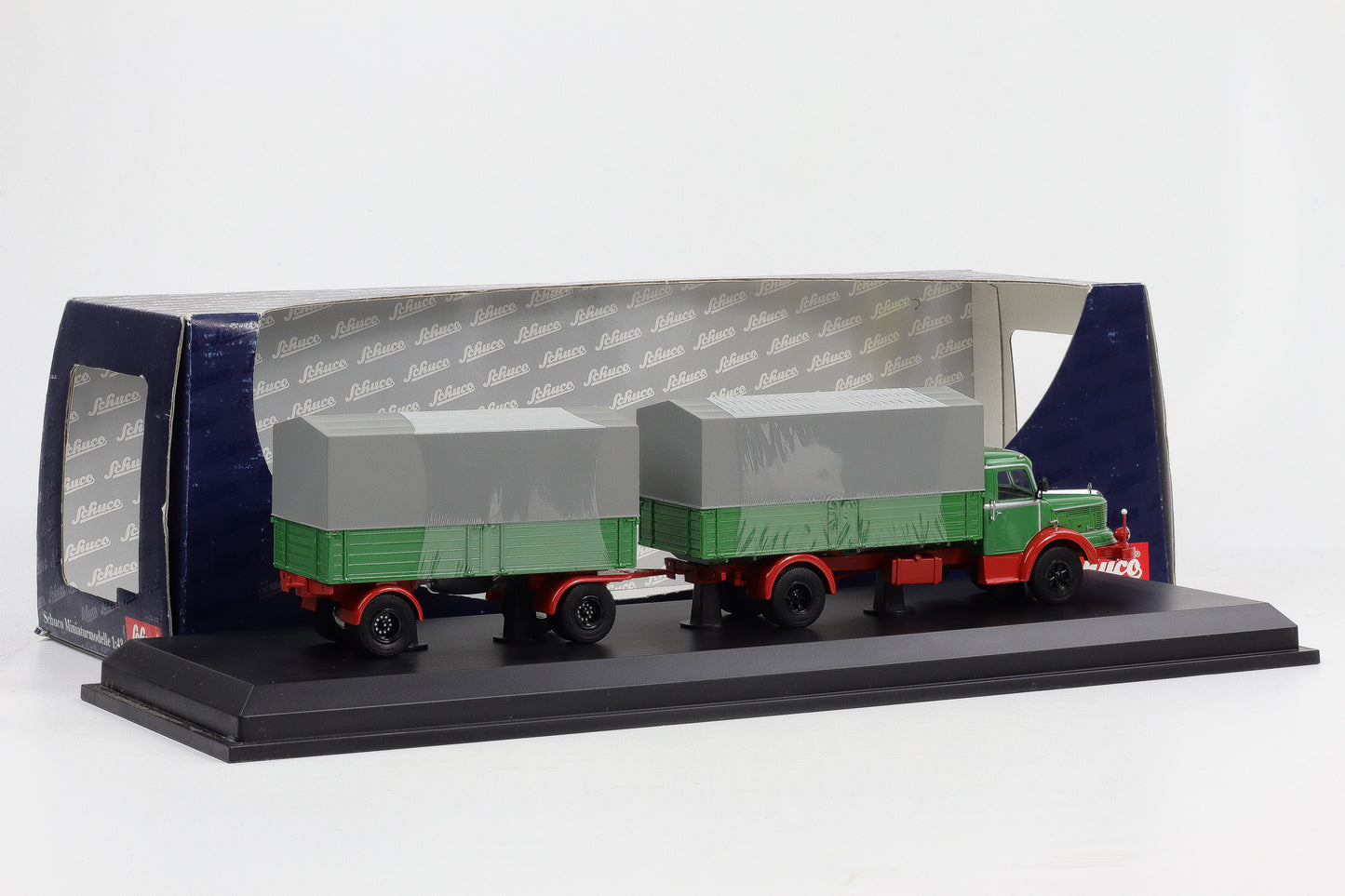 1:43 Schuco Krupp Titan Planen LKW mit Anhänger grün OVP
