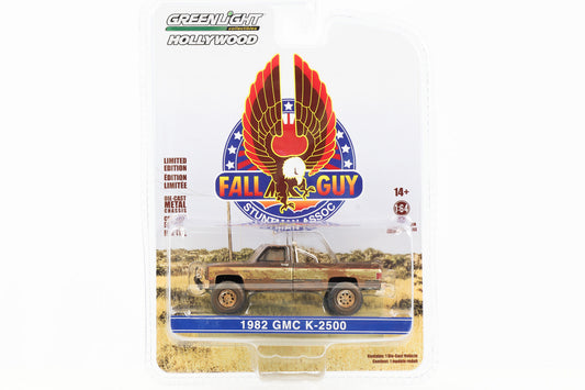 1:64 Fall Guy 1982 GMC K-2500 dirty Greenlight Hollywood