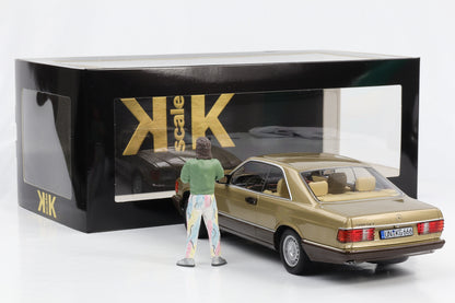 1:18 Mercedes-Benz 500 SEC 1987 gold metallic Bang Boom Bang mit Figur Kalle KK-Scale