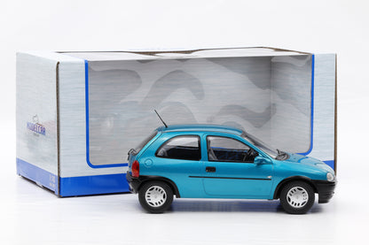 1:18 Opel Corsa B 1993 türkis metallic mit Vitrine MCG18514 diecast