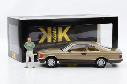 1:18 Mercedes-Benz 500 SEC 1987 gold metallic Bang Boom Bang mit Figur Kalle KK-Scale