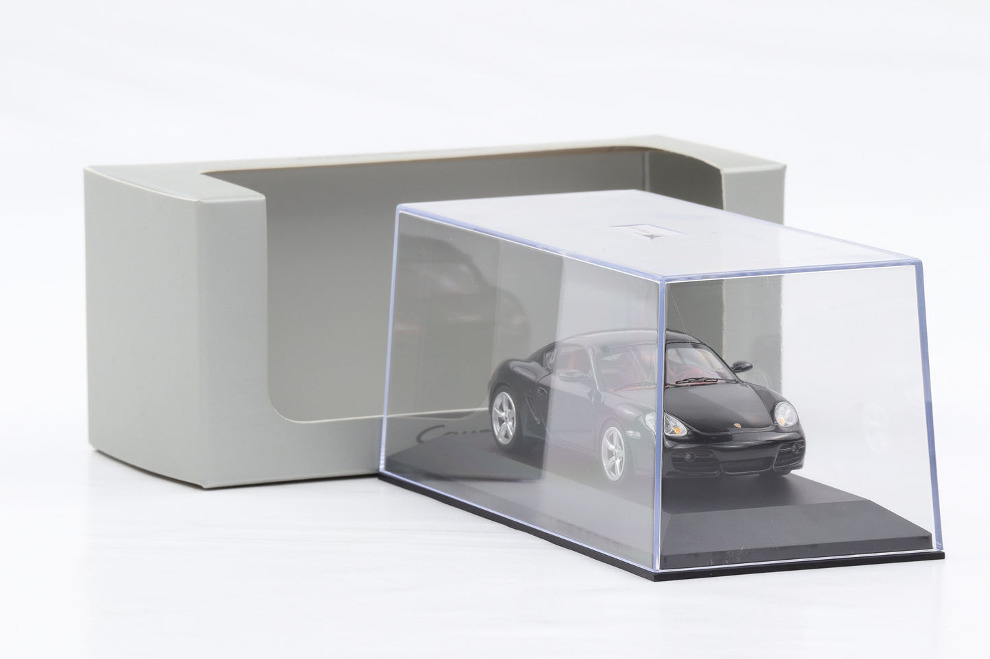 1:43 Schuco Porsche Cayman S 987 2009 schwarz WAP Delaer