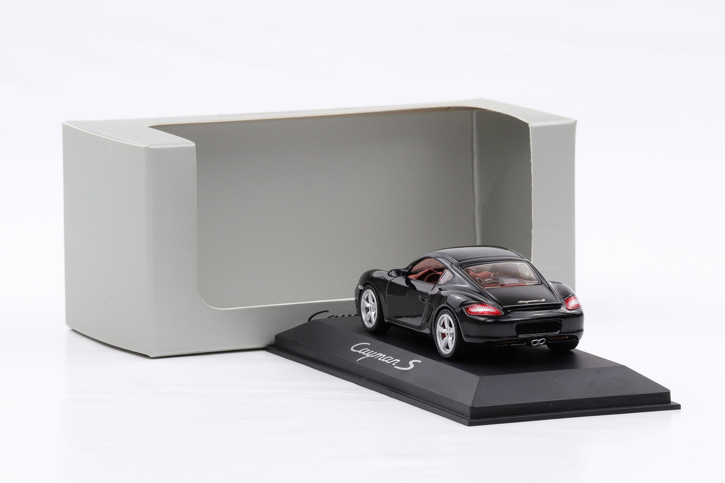 1:43 Schuco Porsche Cayman S 987 2009 schwarz WAP Delaer