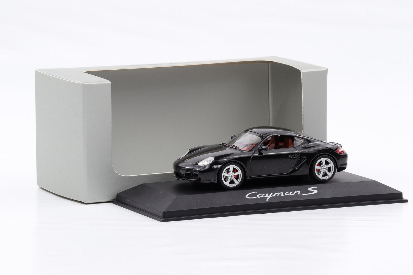 1:43 Schuco Porsche Cayman S 987 2009 schwarz WAP Delaer