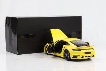 1:18 Porsche 911 992 Turbo S Coupe Sport Design 2021 gelb Minichamps