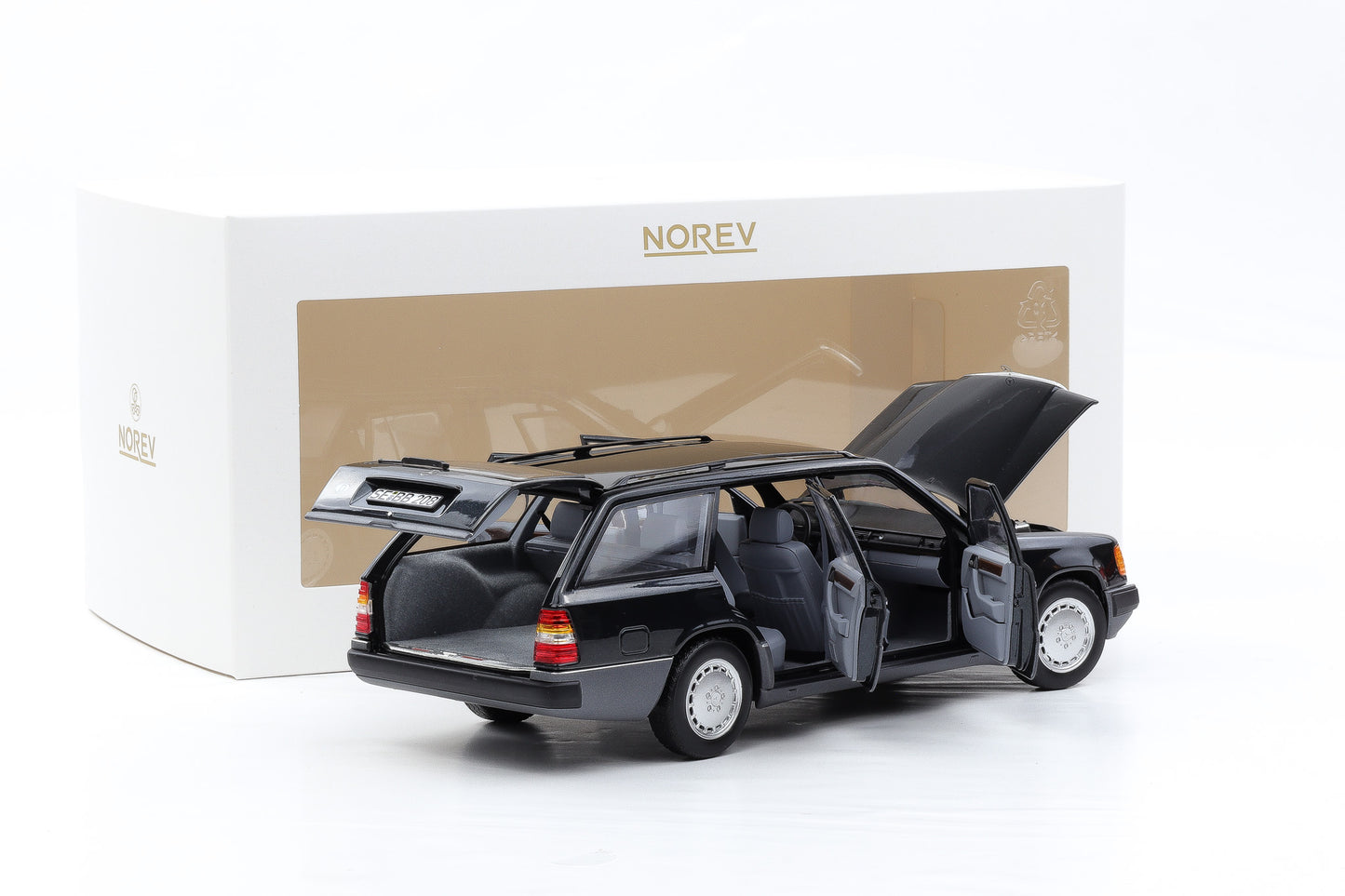 1:18 Norev Mercedes-Benz 300 D T-Modell Kombi S 124 blauschwarz 1990 + Vitrine