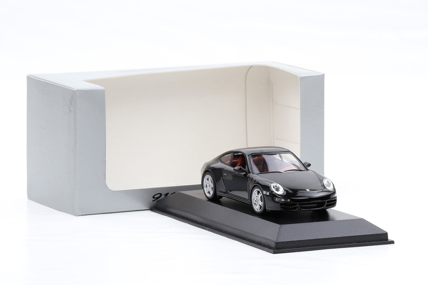 1:43 Minichamps Porsche 911 997 Carrera 4S schwarz / rotes Interieur WAP Dealer