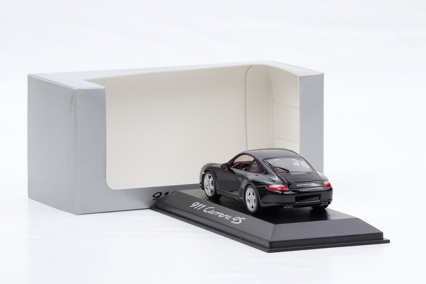 1:43 Minichamps Porsche 911 997 Carrera 4S schwarz / rotes Interieur WAP Dealer