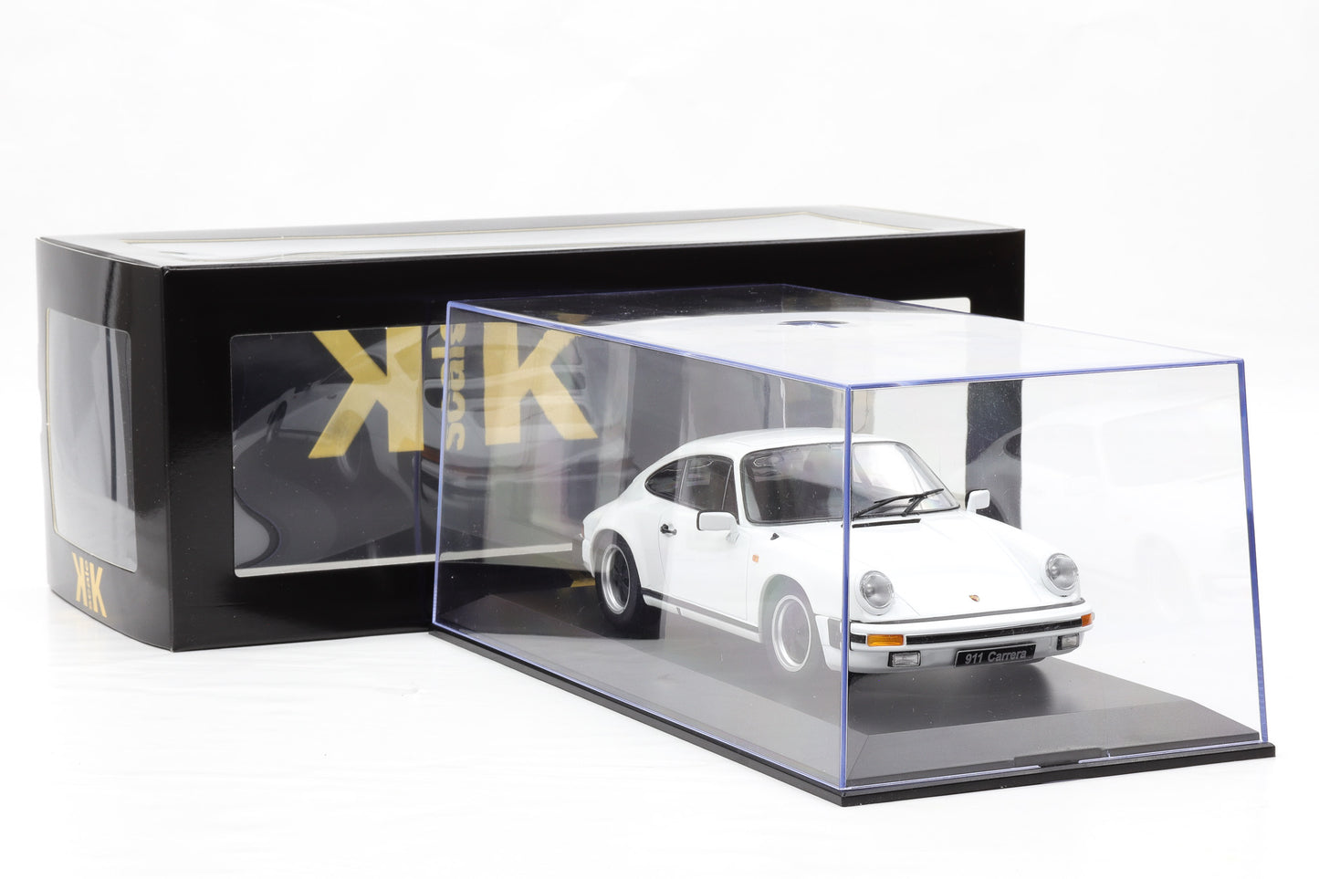 1:18 Porsche 911 Carrera Coupe 1983 weiss schwarz rot + Vitrine KK Scale