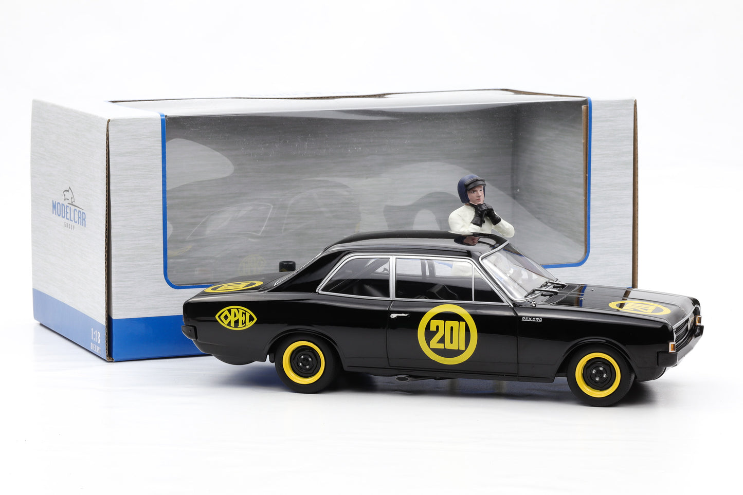 1:18 Opel Rekord C 1900 Schwarze Witwe 1967 + Figur MCG diecast