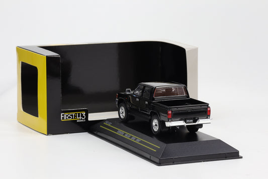 1:43 First Toyota Hilux SR5 schwarz 1997 F43-132 diecast